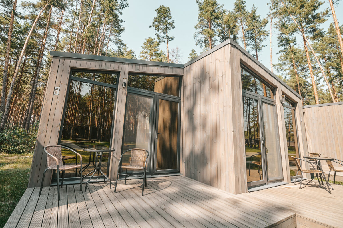 In the forest. Picture of a wooden building in the forest